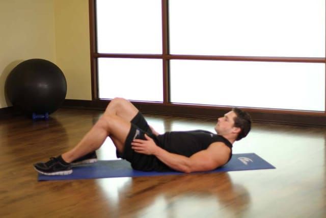 Knees to chest, start position