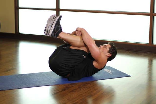 Knees to chest, finish position